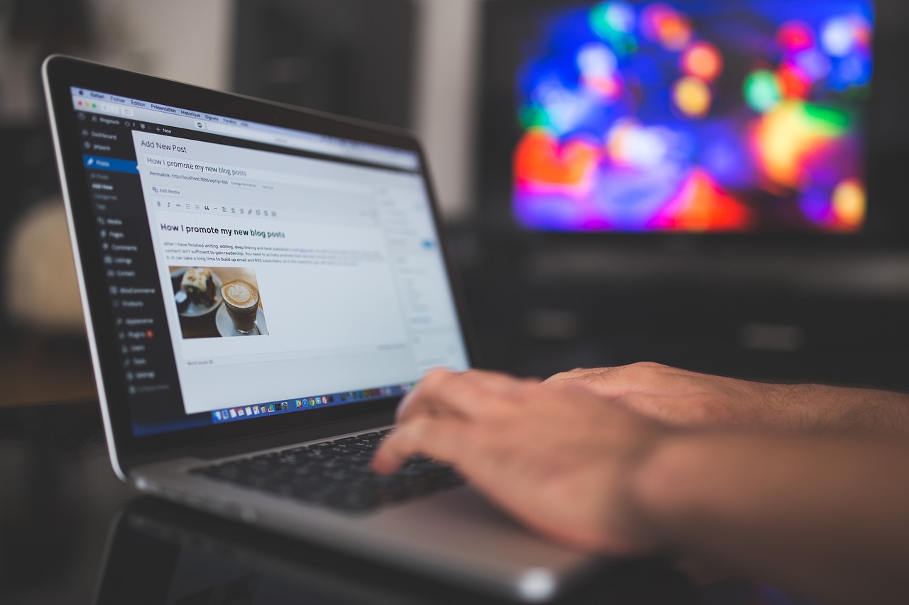 Business owner reviewing their new website on a laptop